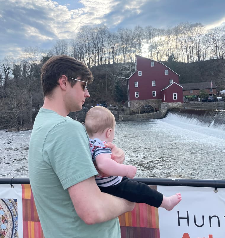Steve holding his son at the Red Mill in Clinton, NJ